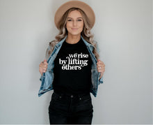 Load image into Gallery viewer, We Rise By Lifting Others Unisex T-shirt
